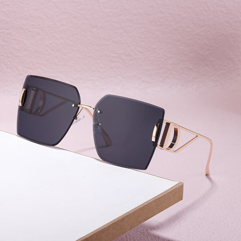 Oversized Rimless Diamond-Cut Sunglasses - detail view